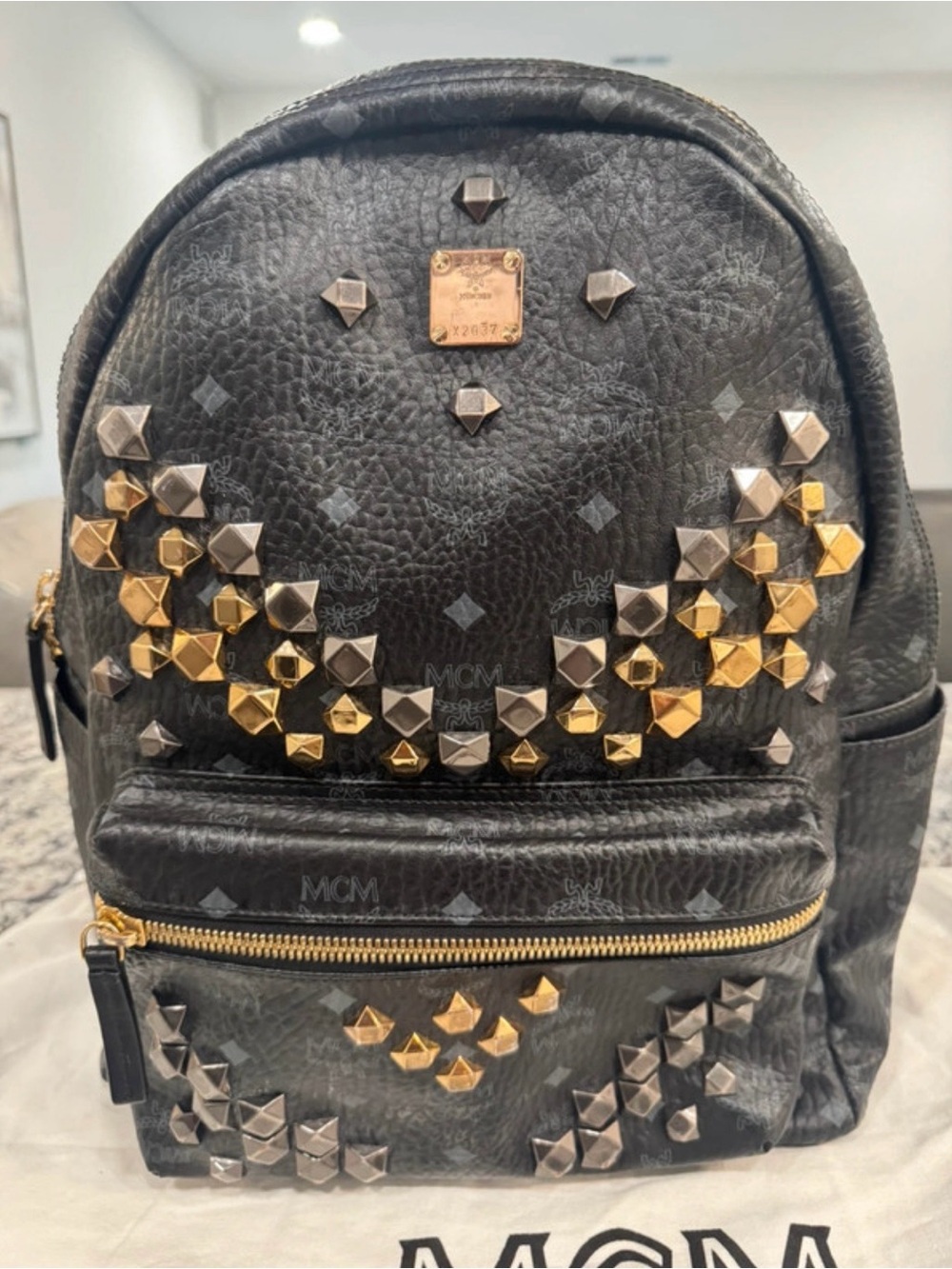 MCM Black Leather Backpack with Gold & Silver Studs